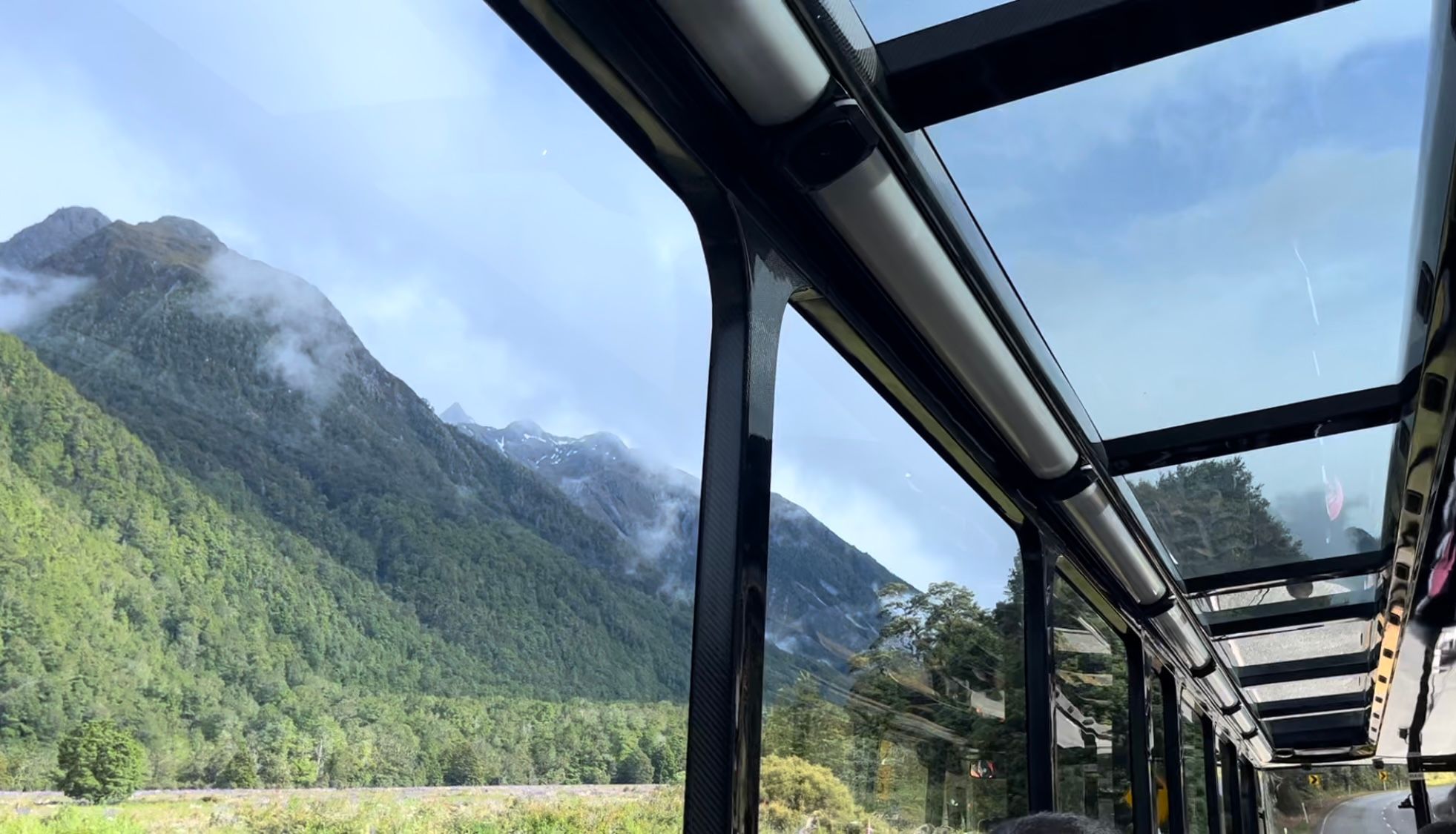 Bus with glass ceiling