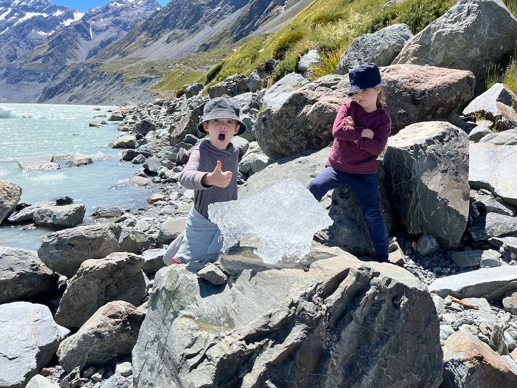 kids playing with ice chunks