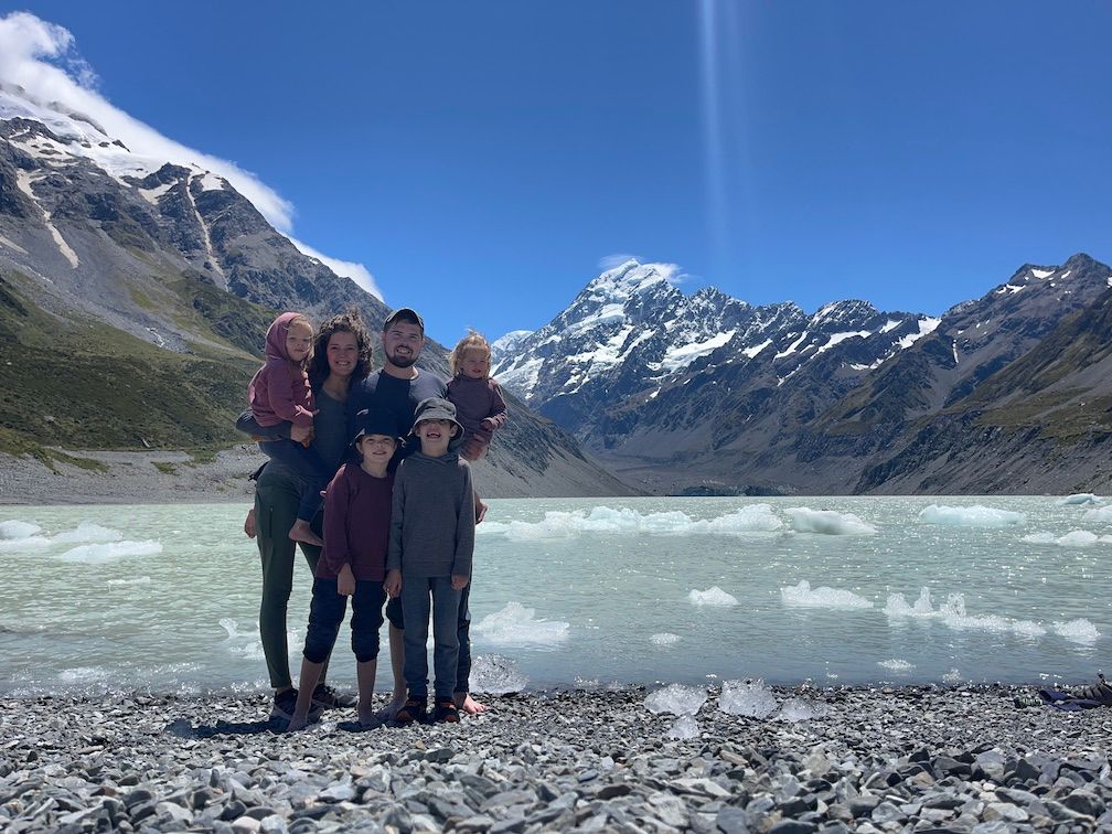 Family picture in front of the glacier lake