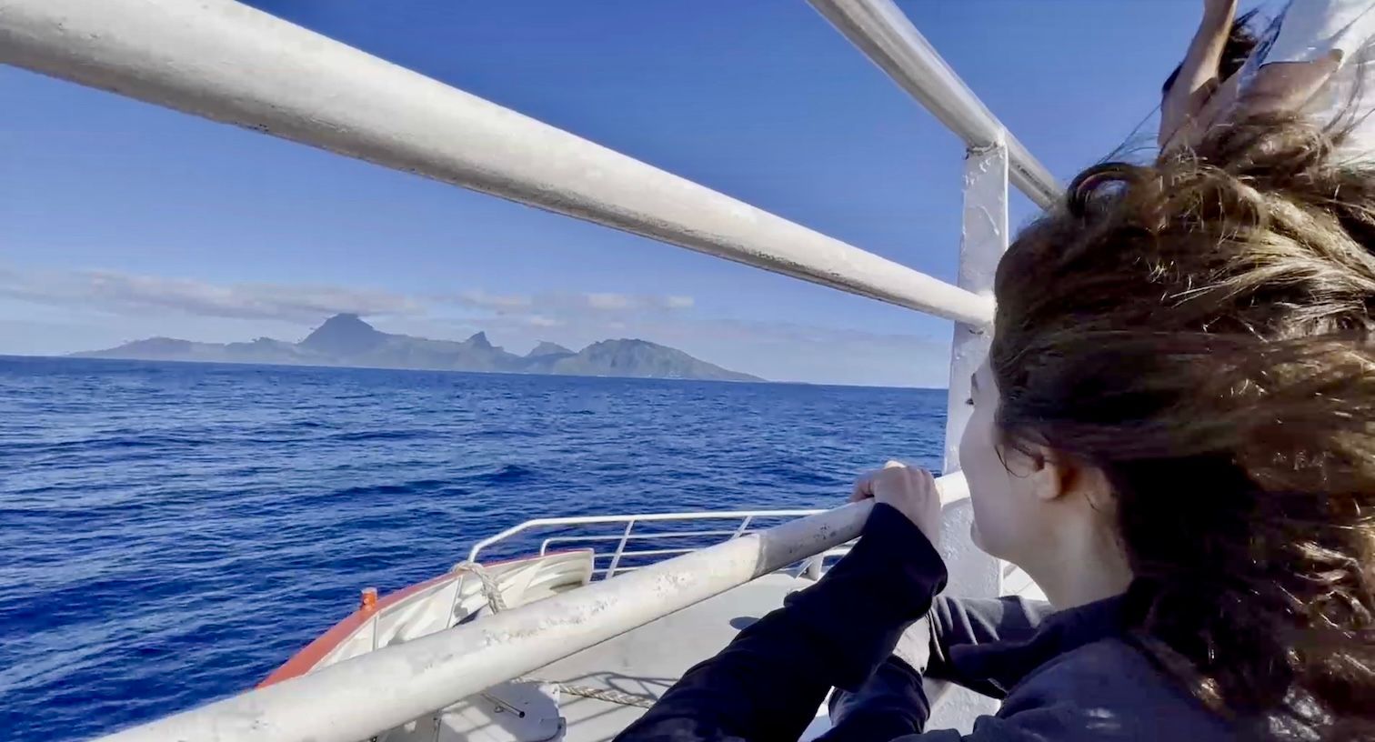 Leslie on the ferry looking at Moorea